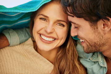 Couple, outdoor and cover with towel for protection from cold in environment for weather, sun or...