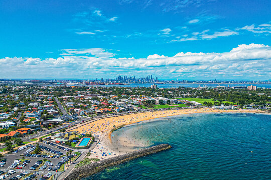 An Aerial view of Williamstown Beach with the Melbourne Skyline in the background on a Sunny Summers Day