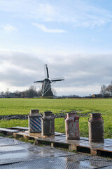 Old milk cans standing in a row. Carbide shooting is a tradition in the Netherlands and usually...