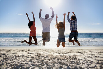 Jump, beach or back of friends on holiday vacation in the air together in summer at sea. Outdoor,...