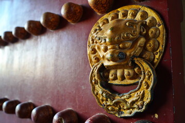 Door handles in the shape of an animal's head. Tiantan Sky Temple.