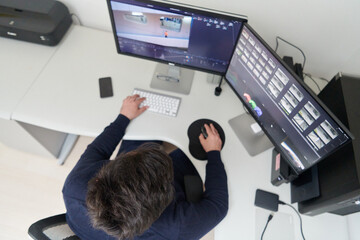 Fototapeta na wymiar professional video editor enhancing digital footage using specialized software