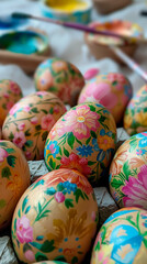 Fototapeta na wymiar Hand-painted Easter eggs adorned with floral patterns, vibrant holiday crafts in shallow depth of field, festive decoration. 