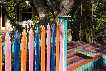 Colorful gate at Richmond road. Garde. Tree and swing. Auckland New Zealand.