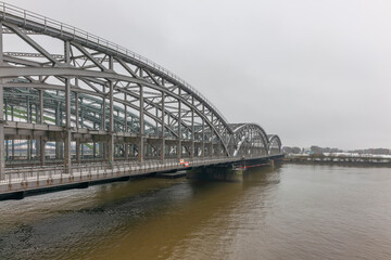 Germany's second largest city Hamburg streets canals and symbolic buildings snow and colorful cloudy sky and daylight in winter