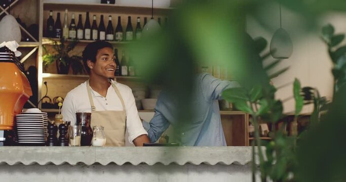 Barista, teamwork and people planning in cafe for customer service, hospitality and training at startup restaurant. Waiter, cashier or small business owner at bar or coffee shop talking of ideas