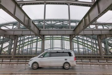 Obraz premium Germany's second largest city Hamburg streets canals and symbolic buildings snow and colorful cloudy sky and daylight in winter