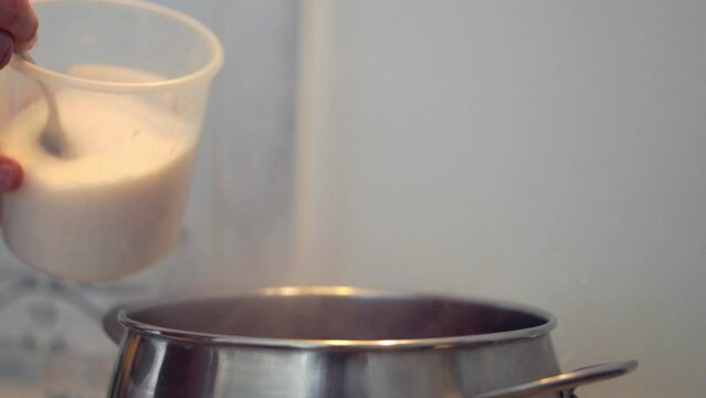 Adding Salt or sugar to Boiling Water