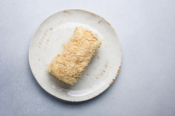 A delicious Napoleon cake in a restaurant. Close-up