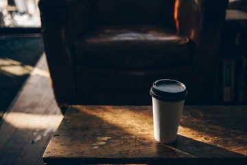 Zelfklevend Fotobehang coffee cup on wooden table © MED Studio
