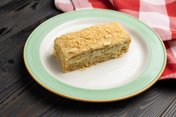 A delicious Napoleon cake in a restaurant. Close-up