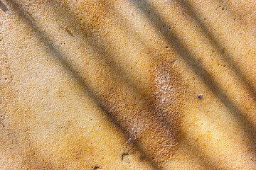 rusty abstract background. brown background. fine texture. paraffin texture. shadow on brown background. rust. rust streaks