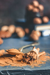 Cinnamon sticks on wooden background.