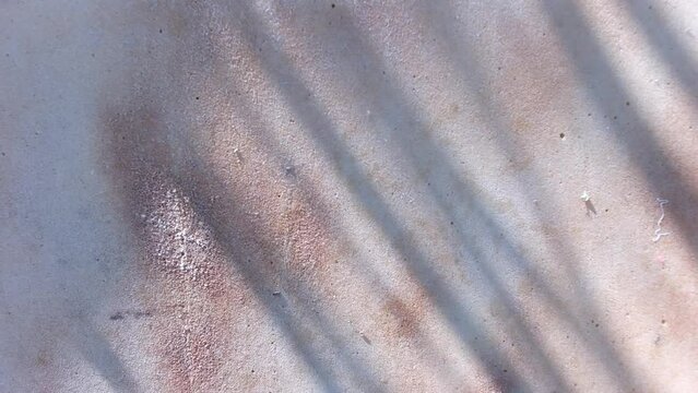 rusty abstract background. brown background. fine texture. paraffin texture. shadow on brown background. rust. rust streaks
