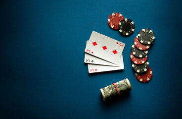 Playing cards with a winning combination of three aces. Winning a game of poker depends on fortune...
