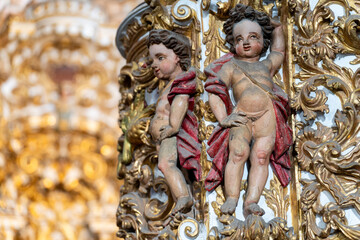 Baroque Cherubs in Ornate Gilded Woodwork Decoration