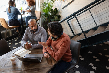 Investor listening to pitch for a business startup