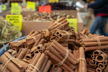 Freshly dried cinnamon sticks for sale at the herbalist,