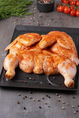 Whole chicken carcass with seasonings for your meat menu or booklet design