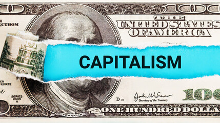 Capitalism. The word Capitalism in the background of the US dollar. Capitalism and Free Market...