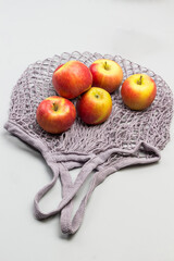 Cotton String Mesh Bag and  red apples