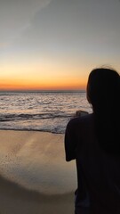 silhouette of a person on the beach