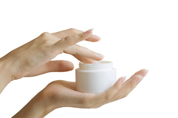 Woman's hand dips her finger into mock-up of white package with cream. Concept of body care, beauty industry.