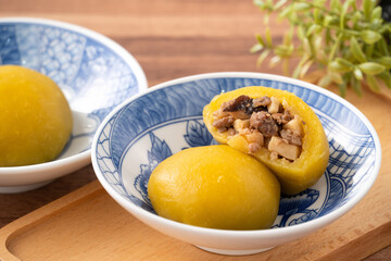 Sweet potato yam bun with ground pork meat, mushroom and chopped bamboo shoot fillings inside.