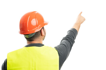 Builder back to camera pointing index finger at blank copyspace