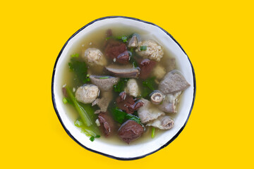 Bowl of pork blood soup on white background.