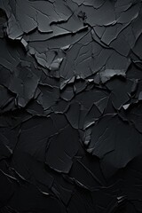 A black wall with visible cracks and fissures. Suitable for backgrounds and textures
