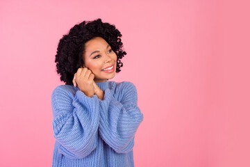Photo portrait of pretty young girl admire pose look empty space dressed stylish clue knitted...