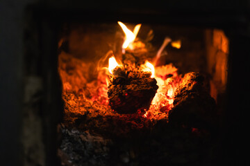 Burning wood in the fireplace. Fire in the furnace.