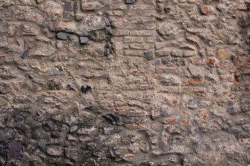 Texture of an old stone wall. Stone background.