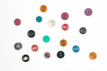 Set of colorful clothing buttons on a white background