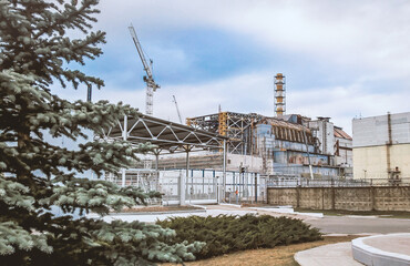 Fototapeta na wymiar sarcophagus of the fourth power unit of the Chernobyl nuclear power plant after the accident