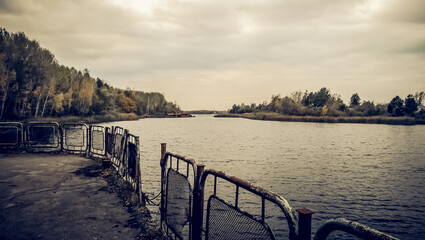 view of the river and the forest from the embankment Chernobyl Ukraine