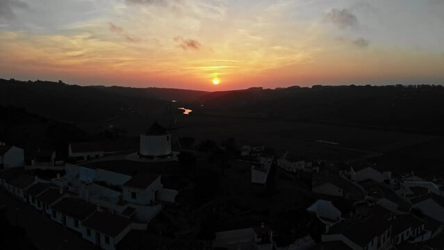 Beatiful aerial view with sunset in Portugal with old windmill