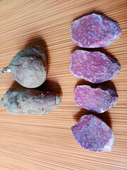 Obraz na płótnie Canvas unpeeled purple sweet potato and purple yam chunks (ube)