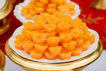 Delicious yellow Thai desserts on the table