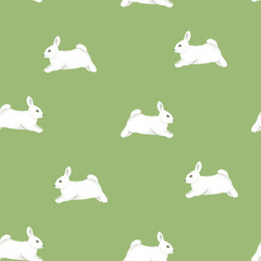 Seamless pattern with cute bunnies jumping on the meadow - 723834042