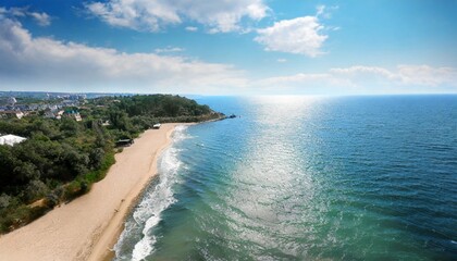 Fototapeta na wymiar aerial view of beautiful sea and sandy beach on sunny day