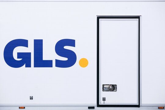 Aarhus, Denmark - March 4, 2022: GLS logo on a vehicle. General Logistics Systems is a dutch british owned logistics company based in Amsterdam and founded in 1999