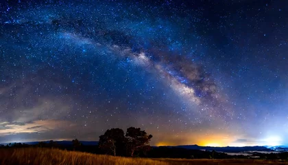 Deurstickers amazing panorama blue night sky milky way and star on dark background universe filled with stars nebula and galaxy with noise and grain photo by long exposure and select white balance selection focus © Raymond