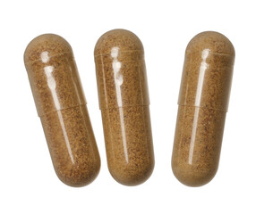 Transparent capsule with brown powder on isolated background, medical drug. Top view