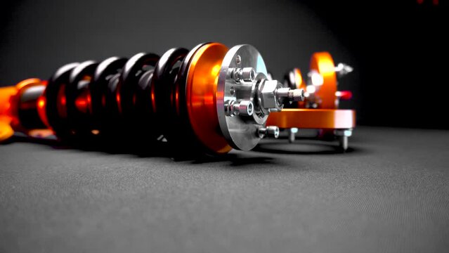 suspension tuning, coilovers, shock absorbers and front springs in yellow and gold colors for a sports drift car on a dark background
