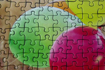 Closeup View of Jigsaw Puzzle Section with Puzzle Pieces in Place - 723868437