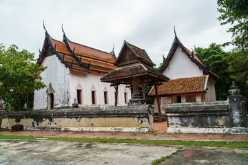 The old temple is surrounded by a wall.