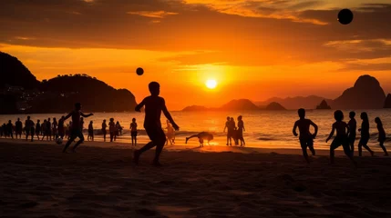 Papier Peint photo Copacabana, Rio de Janeiro, Brésil Silhouettes of many children playing beach soccer on the seashore at sunset. Summer vacation, holiday, summer sport, active lifestyle.