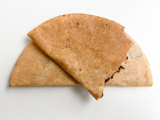Thin crepes, half round shape, with chocolate filling